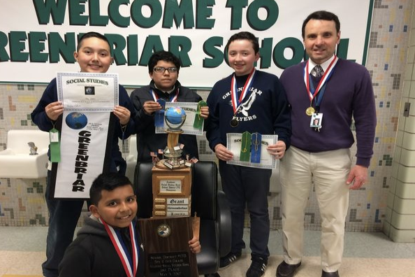 students with award for social studies