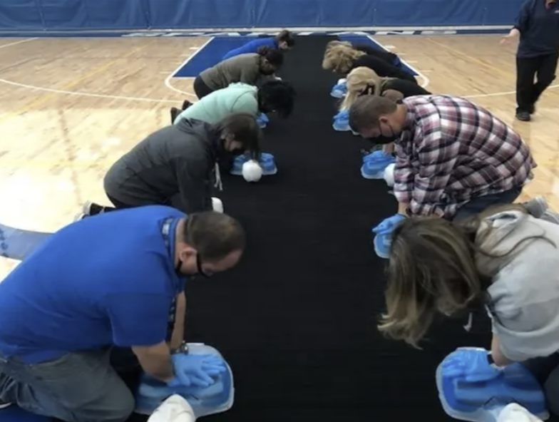staff learning cpr