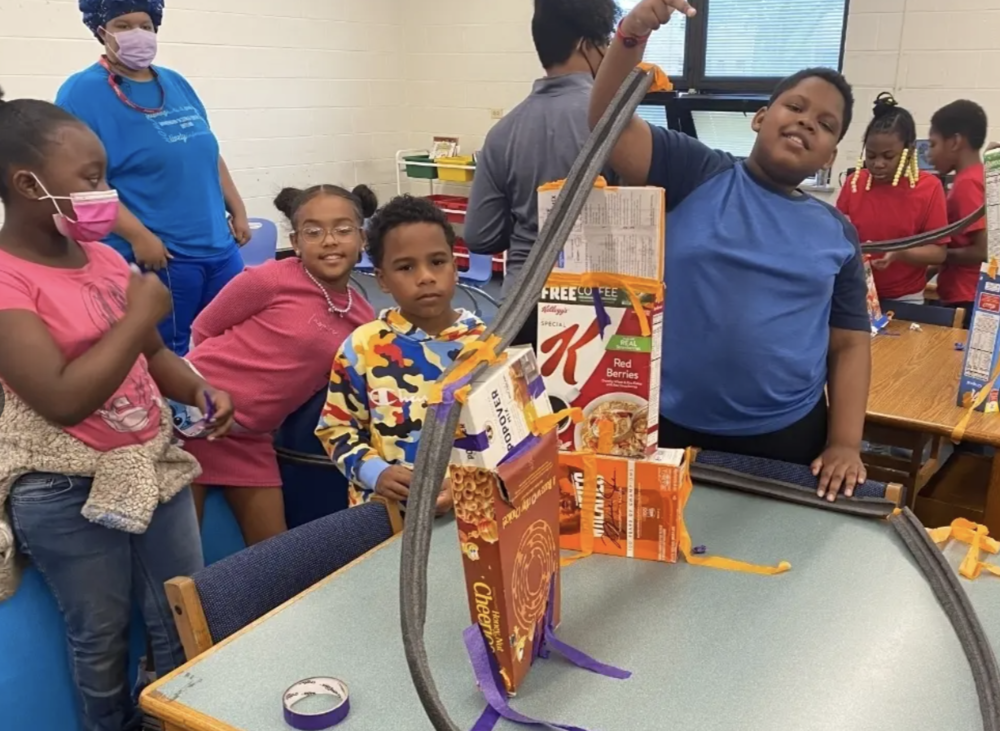 Student with engineering project
