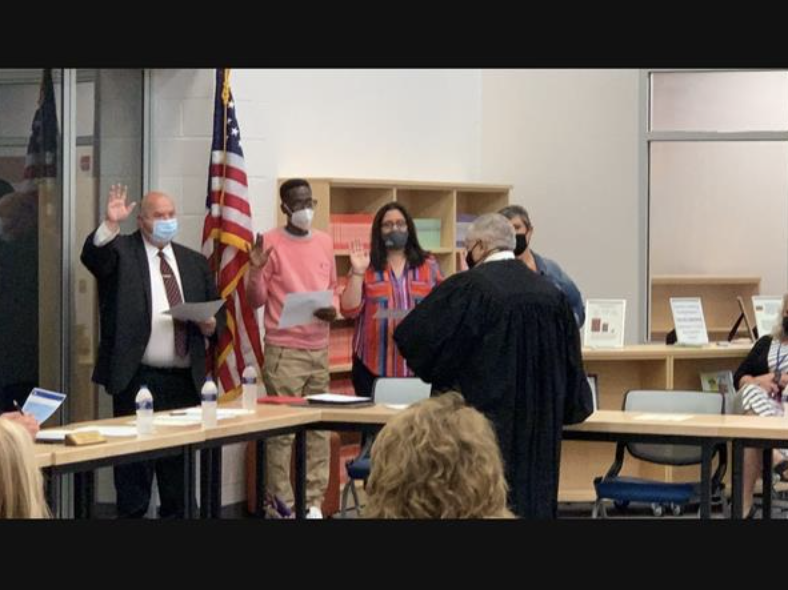 board of education being inducted