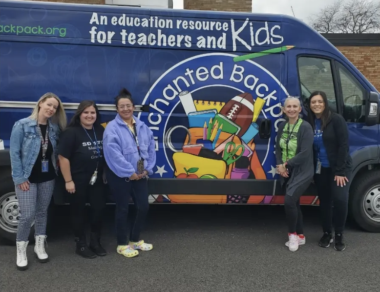 Teachers with the enchanted backpack van