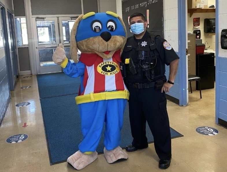 washington mckinley mascot with a cop